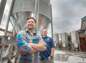 Ian Rodgers (left) and Kevin Winter (head brewer) standing proudly inside the Mission Springs Brewery.