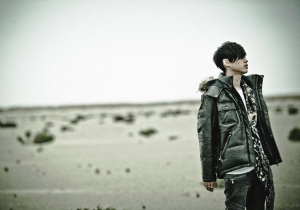 Tablo as he appeared in his solo track with Taeyang, 