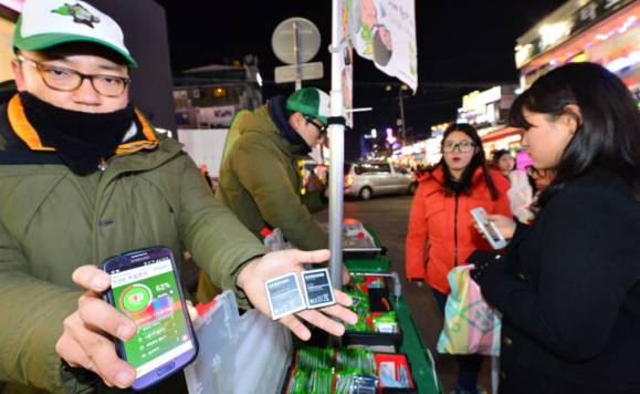 There are booths set up in busy areas in Seoul where you can exchange a fully charged battery for a small price. 